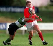 12 September 1998: Killian Keane of Munster is tackled by Simon Allnutt of Connacht during the Guinness Interprovincial Rugby Championship match between Munster and Connacht at Dooradoyle in Limerick. Photo by Matt Browne/Sportsfile