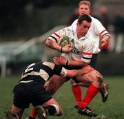 19 December 1998: Mark Crothers of Malone in action against Alan Linnane of Old Belevdere during the AIB All Ireland League Division 2 match between Old Belvedere and Malone at Anglesea Road in Dublin. Photo by Ray McManus/Sportsfile