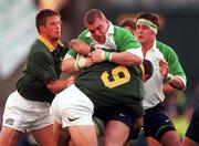 28 November 1998; Victor Costello of Ireland is tackled by Joost van der Westhuizen of South Africa during a International Friendly Match between Ireland and South Africa at Landsdowne Road in Dublin. Photo by Brendan Moran/Sportsfile