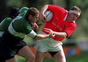 12 September 1998: Michael Galwey of Munster is tackled by Graham Heaslip of Connacht during the Guinness Interprovincial Rugby Championship match between Munster and Connacht at Dooradoyle in Limerick. Photo by Matt Browne/Sportsfile