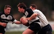 19 December 1998: Pat Kilduff of Old Belvedere is tackled by Mark Crothers of Malone during the AIB All Ireland League Division 2 match between Old Belvedere and Malone at Anglesea Road in Dublin. Photo by Ray McManus/Sportsfile