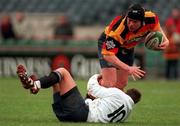5 December 1998. Shane McEntee of Lansdowne is tackled by Ronan O'Gara of Cork Constitution during the AIB All-Ireland League match between Lansdowne and Cork Constitution at Lansdowne Road in Dublin. Photo by Brendan Moran/Sportsfile.
