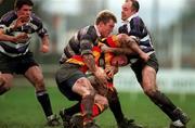 2 January 1999: Shane McEntee of Landsdowne in action against Eric Miller and Craig Fitzpatrick of Terenure during the AIB All-Ireland League Division 1 match between Terenure College and Lansdowne at Lakelands Park in Dublin. Photo by Brendan Moran/Sportsfile.