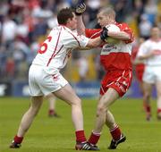9 May 2004; Francis McEldowney, Derry, in action against Gavin Devlin, Tyrone. Bank of Ireland Ulster Senior Football Championship, Tyrone v Derry, St. Tighernach's Park, Clones, Co. Monaghan. Picture credit; Damien Eagers / SPORTSFILE