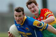 9 May 2004; Liam Kennan, Longford, in action against Thomas Walsh, Carlow. Bank of Ireland Leinster Senior Football Championship, Carlow v Longford, O'Connor Park, Tullamore, Co. Offaly. Picture credit; David Maher / SPORTSFILE