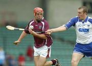 9 May 2004; Alan Kerins, Galway, in action against Eoin McGrath, Waterford. Allianz Hurling League Final, Division 1, Galway v Waterford, Gaelic Grounds, Limerick. Picture credit; Brendan Moran / SPORTSFILE
