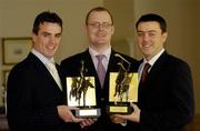 11 May 2004; Galway footballer Padraig Joyce, left, and Waterford hurler Paul Flynn, right, who were presented with the Vodafone GAA Allstars Players of the Month for April by Enda Lynch, Sponsorship Executive, Vodafone, at a luncheon in the Westin Hotel, Dublin. Picture credit; Brendan Moran / SPORTSFILE