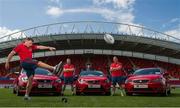 7 August 2013; SEAT, Ireland’s fastest growing car brand, today announced a new partnership with Munster Rugby. The three year deal will see SEAT become the official car partner to Munster Rugby and title sponsor of the Munster Schools Senior and Junior Cups. The partnership also includes SEAT supporting all pre-season Munster Senior Rugby Team matches in Thomond Park in the newly entitled “SEAT Series”, which will kick off on the 24th of August when Munster take on Gloucester. Munster’s star players Mike Sherry, BJ Botha, Keith Earls and Andrew Conway along with Cian O’Brien, Director of SEAT and Garrett Fitzgerald, CEO Munster Rugby were all present to launch the partnership. For further information on SEAT Ireland www.SEAT.ie and for Munster Rugby visit www.MunsterRugby.ie. Pictured are Munster's Andrew Conway with Keith Earls and BJ Botha. Thomond Park, Limerick. Picture credit: Matt Browne / SPORTSFILE
