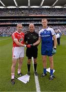 3 August 2013; The Tyrone captain Stephen O'Neill and the Monaghan captain Owen Lennon shake hands across referee Cormac Reilly. GAA Football All-Ireland Senior Championship, Quarter-Final, Monaghan v Tyrone, Croke Park, Dublin. Picture credit: Ray McManus / SPORTSFILE