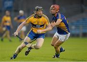 7 August 2013; Jamie Shanahan, Clare, in action against Colin O'Riordan, Tipperary. Bord Gáis Energy Munster GAA Hurling Under 21 Championship Final, Tipperary v Clare, Semple Stadium, Thurles, Co. Tipperary. Picture credit: Matt Browne / SPORTSFILE