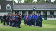27 May 2022; North West Warriors and the Northern Knights pause for a minutes silents in respect for the passing of former Cricket Ireland President MBE Dixon Rose and Woodvale CC player Trevor Johnston before  the Cricket Ireland Inter-Provincial Trophy match between Northern Knights and North West Warriors at North Down Cricket Club, Comber in Down. Photo by George Tewkesbury/Sportsfile