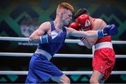 27 May 2022; Kiaran Macdonald of England, left, and Sean Mari of Ireland during their 51kg bout at the EUBC Elite Men's European Boxing Championships Preliminary Rounds at Karen Demirchyan Sports and Concerts Complex in Yerevan, Armenia. Photo by Hrach Khachatryan/Sportsfile