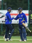 27 May 2022; Stephen Doheny of North West Warriors and Andy McBrine of North West Warriors celebrate after the Cricket Ireland Inter-Provincial Trophy match between Northern Knights and North West Warriors at North Down Cricket Club, Comber in Down. Photo by George Tewkesbury/Sportsfile