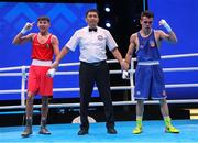 27 May 2022; James Dylan Eagleson of Ireland is declared victorious over Gabriel Mascunano Escobar of Spain, right, following their 54kg bout at the EUBC Elite Men's European Boxing Championships Preliminary Rounds at Karen Demirchyan Sports and Concerts Complex in Yerevan, Armenia. Photo by Hrach Khachatryan/Sportsfile