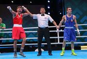 27 May 2022; James Dylan Eagleson of Ireland is declared victorious over Gabriel Mascunano Escobar of Spain, right, following their 54kg bout at the EUBC Elite Men's European Boxing Championships Preliminary Rounds at Karen Demirchyan Sports and Concerts Complex in Yerevan, Armenia. Photo by Hrach Khachatryan/Sportsfile