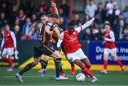 27 May 2022; Tunde Owolabi of St Patrick's Athletic in action against Mark Connolly and Andy Boyle of Dundalk during the SSE Airtricity League Premier Division match between Dundalk and St Patrick's Athletic at Oriel Park in Dundalk, Louth. Photo by Ben McShane/Sportsfile