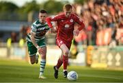 27 May 2022; Shane Farrell of Shelbourne in action against Andy Lyons of Shamrock Rovers during the SSE Airtricity League Premier Division match between Shamrock Rovers and Shelbourne at Tallaght Stadium in Dublin. Photo by Eóin Noonan/Sportsfile