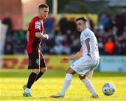 27 May 2022; Liam Burt of Bohemians in action against Dylan Grimes of Drogheda United during the SSE Airtricity League Premier Division match between Bohemians and Drogheda United at Dalymount Park in Dublin. Photo by Michael P Ryan/Sportsfile