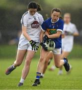 21 May 2022; Neasa Dwan of Tipperary is tackled by Jessica McNulty of Kildare  during theLadies Football U14 All-Ireland Gold Final match between Kildare and Tipperary at Crettyard GAA in Laois. Photo by Ray McManus/Sportsfile