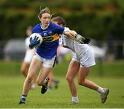 21 May 2022; Abbie Horgan of Tipperary in action against Aoife Treacy of Kildare during the Ladies Football U14 All-Ireland Gold Final match between Kildare and Tipperary at Crettyard GAA in Laois. Photo by Ray McManus/Sportsfile