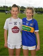 21 May 2022; Cousins Amy Jones of Kildare and Grace Hogan of Tipperary after theLadies Football U14 All-Ireland Gold Final match between Kildare and Tipperary at Crettyard GAA in Laois. Photo by Ray McManus/Sportsfile