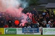 27 May 2022; Drogheda United supporters celebrate their sides first goal scored by Dean Williams during the SSE Airtricity League Premier Division match between Bohemians and Drogheda United at Dalymount Park in Dublin. Photo by Michael P Ryan/Sportsfile