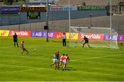 28 May 2022; Emma Cleary of Cork scores her side's first goal, from a penalty, past Kerry goalkeeper Ciara Butler during the TG4 Munster Senior Ladies Football Championship Final match between Kerry and Cork at Fitzgerald Stadium in Killarney. Photo by Diarmuid Greene/Sportsfile