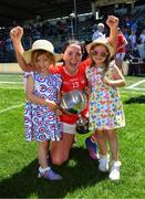 28 May 2022; Eimear Scally of Cork celebrates with her nieces Nancy Rogers, aged 4, left and Grace Rogers, aged 5 after the TG4 Munster Senior Ladies Football Championship Final match between Kerry and Cork at Fitzgerald Stadium in Killarney. Photo by Diarmuid Greene/Sportsfile