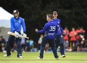 28 May 2022; Andy McBrine of North West Warriors celebrates as he takes the final wicket to win the game for his side during the Cricket Ireland Inter-Provincial Trophy match between North West Warriors and Leinster Lightning at North Down Cricket Club in Comber, Down. Photo by George Tewkesbury/Sportsfile