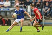 28 May 2022; James Smith of Cavan in action against Adam Lynch of Down during the Tailteann Cup Round 1 match between Cavan and Down at Kingspan Breffni in Cavan. Photo by Oliver McVeigh/Sportsfile