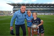 28 May 2022; Dublin manager Mick Bohan, daughter Freya right, and Sinéad Goldrick celebrate with the Mary Ramsbottom Cup after the Leinster LGFA Senior Football Championship Final match between Meath and Dublin at Croke Park in Dublin. Photo by Stephen McCarthy/Sportsfile