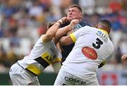 28 May 2022; Tadhg Furlong of Leinster is tackled by Wiaan Liebenberg, left, and Wiaan Liebenberg of La Rochelle during the Heineken Champions Cup Final match between Leinster and La Rochelle at Stade Velodrome in Marseille, France. Photo by Ramsey Cardy/Sportsfile