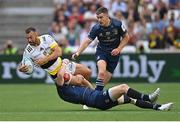 28 May 2022; Dillyn Leyds of La Rochelle is tackled by Robbie Henshaw of Leinster during the Heineken Champions Cup Final match between Leinster and La Rochelle at Stade Velodrome in Marseille, France. Photo by Ramsey Cardy/Sportsfile