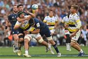 28 May 2022; Grégory Alldritt of La Rochelle is tackled by Jimmy O'Brien, left, and Caelan Doris of Leinster during the Heineken Champions Cup Final match between Leinster and La Rochelle at Stade Velodrome in Marseille, France. Photo by Ramsey Cardy/Sportsfile