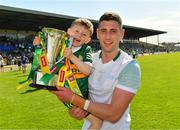 28 May 2022; Paul Geaney of Kerry and his son Paidi, aged 5, celebrate with the cup after the Munster GAA Football Senior Championship Final match between Kerry and Limerick at Fitzgerald Stadium in Killarney. Photo by Diarmuid Greene/Sportsfile