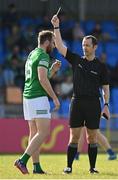28 May 2022; Referee Jerome Henry shows a yellow card to Sean Quigley of Fermanagh during the Tailteann Cup Round 1 match between Longford and Fermanagh at Glennon Brothers Pearse Park in Longford. Photo by Sam Barnes/Sportsfile