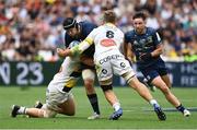 28 May 2022; Caelan Doris of Leinster is tackled by Pierre Bourgarit, left, and Wiaan Liebenberg of La Rochelle during the Heineken Champions Cup Final match between Leinster and La Rochelle at Stade Velodrome in Marseille, France. Photo by Harry Murphy/Sportsfile