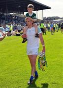 28 May 2022; Paul Geaney of Kerry and his son Paidi, aged 5, leave the field with the cup after the Munster GAA Football Senior Championship Final match between Kerry and Limerick at Fitzgerald Stadium in Killarney. Photo by Diarmuid Greene/Sportsfile