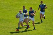 28 May 2022; Adrian Enright of Limerick in action against Tony Brosnan, Jack Barry and Sean O’Shea of Kerry during the Munster GAA Football Senior Championship Final match between Kerry and Limerick at Fitzgerald Stadium in Killarney. Photo by Diarmuid Greene/Sportsfile