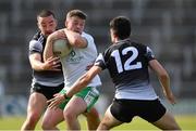 28 May 2022; Natham McElwaine of London in action against Paul Kilcoyne, left, and Mikey Gordon of Sligo during the Tailteann Cup Round 1 match between Sligo and London at Markievicz Park in Sligo. Photo by Ray McManus/Sportsfile