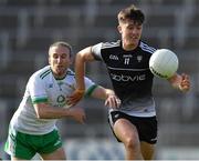 28 May 2022; Patrick O'Connor of Sligo in action against Ronan Sloan of London during the Tailteann Cup Round 1 match between Sligo and London at Markievicz Park in Sligo. Photo by Ray McManus/Sportsfile