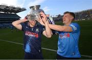 28 May 2022; Dublin goalkeeper Evan Comerford, left, and Cian Murphy celebrate with the Delaney Cup after the Leinster GAA Football Senior Championship Final match between Dublin and Kildare at Croke Park in Dublin. Photo by Stephen McCarthy/Sportsfile