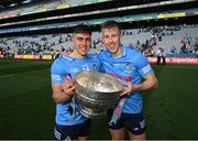 28 May 2022; Lorcan O'Dell, left, and Seán Bugler of Dublin celebrate with the Delaney Cup after the Leinster GAA Football Senior Championship Final match between Dublin and Kildare at Croke Park in Dublin. Photo by Stephen McCarthy/Sportsfile