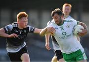 28 May 2022; James Gallagher of London in action against Paul Kilcoyne of Sligo during the Tailteann Cup Round 1 match between Sligo and London at Markievicz Park in Sligo. Photo by Ray McManus/Sportsfile