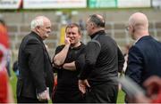 28 May 2022; Down manager James McCartan, centre, with Sean Og McAteer, Down secretary, left, and Down assistant manager Aidan O'Rourke, right, after the Tailteann Cup Round 1 match between Cavan and Down at Kingspan Breffni in Cavan. Photo by Oliver McVeigh/Sportsfile
