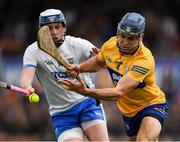 22 May 2022; Cian Nolan of Clare is tackled by Stephen Bennett of Waterford during the Munster GAA Hurling Senior Championship Round 5 match between Clare and Waterford at Cusack Park in Ennis, Clare. Photo by Ray McManus/Sportsfile