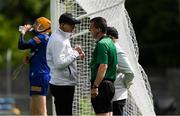 22 May 2022; Referee Paud O'Dwyer talks to his umpires, before issuing two yellow cards, during the Munster GAA Hurling Senior Championship Round 5 match between Clare and Waterford at Cusack Park in Ennis, Clare. Photo by Ray McManus/Sportsfile