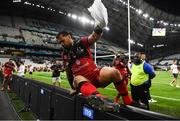 27 May 2022; Jordan Taufua of Lyon jumps the advertising hoardings after his side's victory in the Heineken Challenge Cup Final match between Lyon and Toulon at Stade Velodrome in Marseille, France. Photo by Harry Murphy/Sportsfile