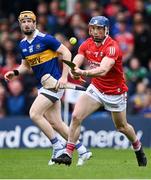 22 May 2022; Seán O'Donoghue of Cork in action against Jake Morris of Tipperary during the Munster GAA Hurling Senior Championship Round 5 match between Tipperary and Cork at FBD Semple Stadium in Thurles, Tipperary. Photo by Piaras Ó Mídheach/Sportsfile