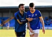 28 May 2022; Longford manager Billy O'Loughlin, left, with Keelin McGann of Longford after he was substituted during the Tailteann Cup Round 1 match between Longford and Fermanagh at Glennon Brothers Pearse Park in Longford. Photo by Sam Barnes/Sportsfile